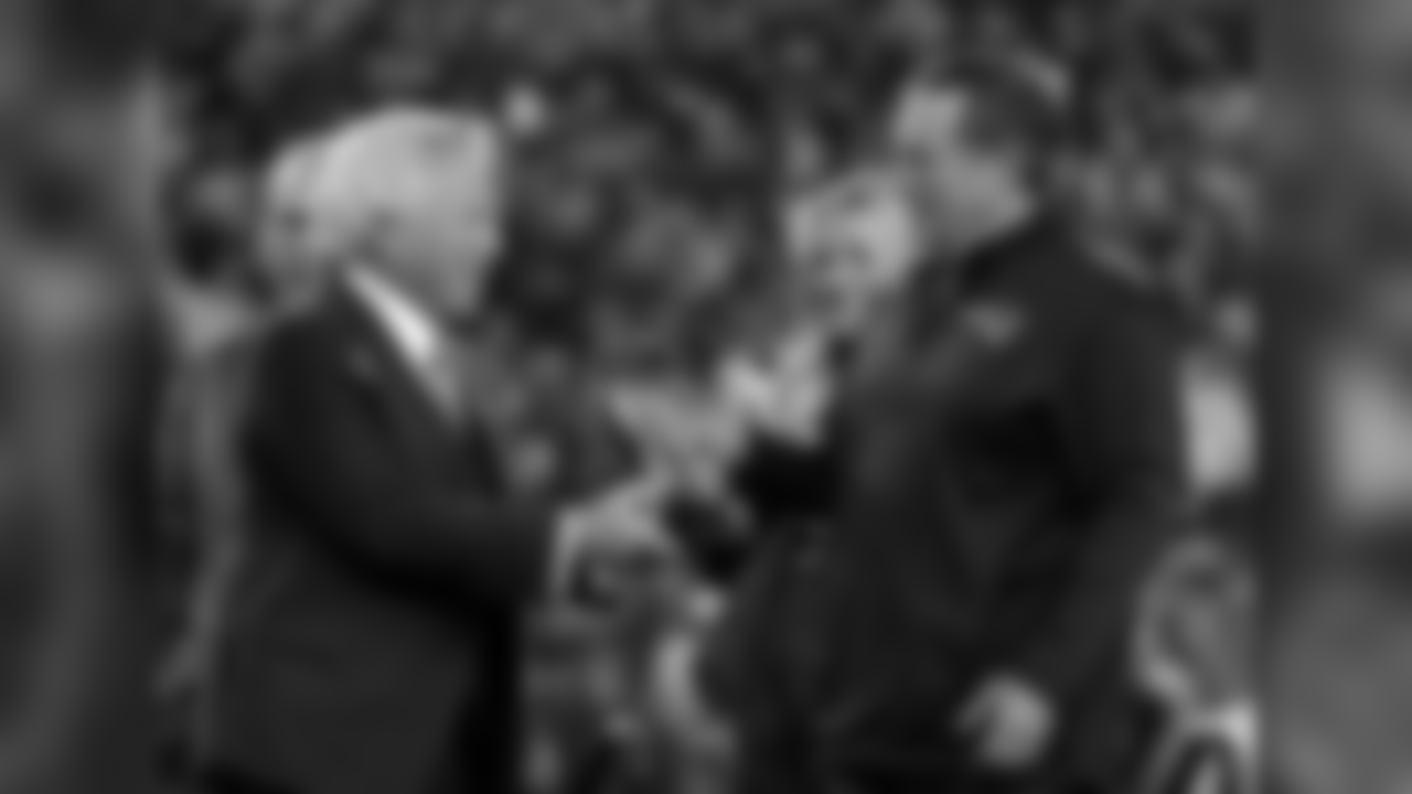 New England Patriots owner Robert Kraft, left, hand the trophy to head coach Bill Belichick after the AFC championship NFL football game against the Jacksonville Jaguars, Sunday, Jan. 21, 2018, in Foxborough, Mass. The Patriots won 24-20. (AP Photo/Winslow Townson)
