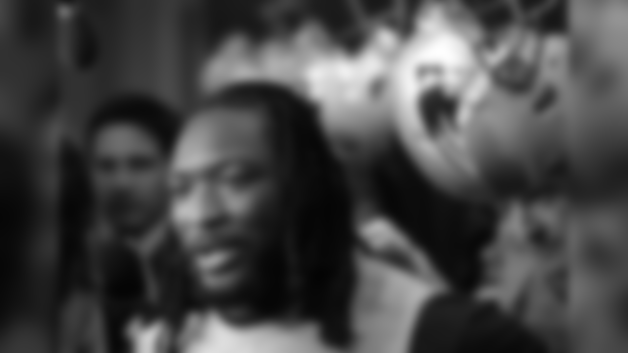 New England Patriots running back LeGarrette Blount speaks with members of the media in the team's locker room following an NFL football team practice, Thursday, Jan. 26, 2017, in Foxborough, Mass. The Patriots are to play the Atlanta Falcons in Super Bowl LI, Feb. 5, 2017, in Houston. (AP Photo/Steven Senne)