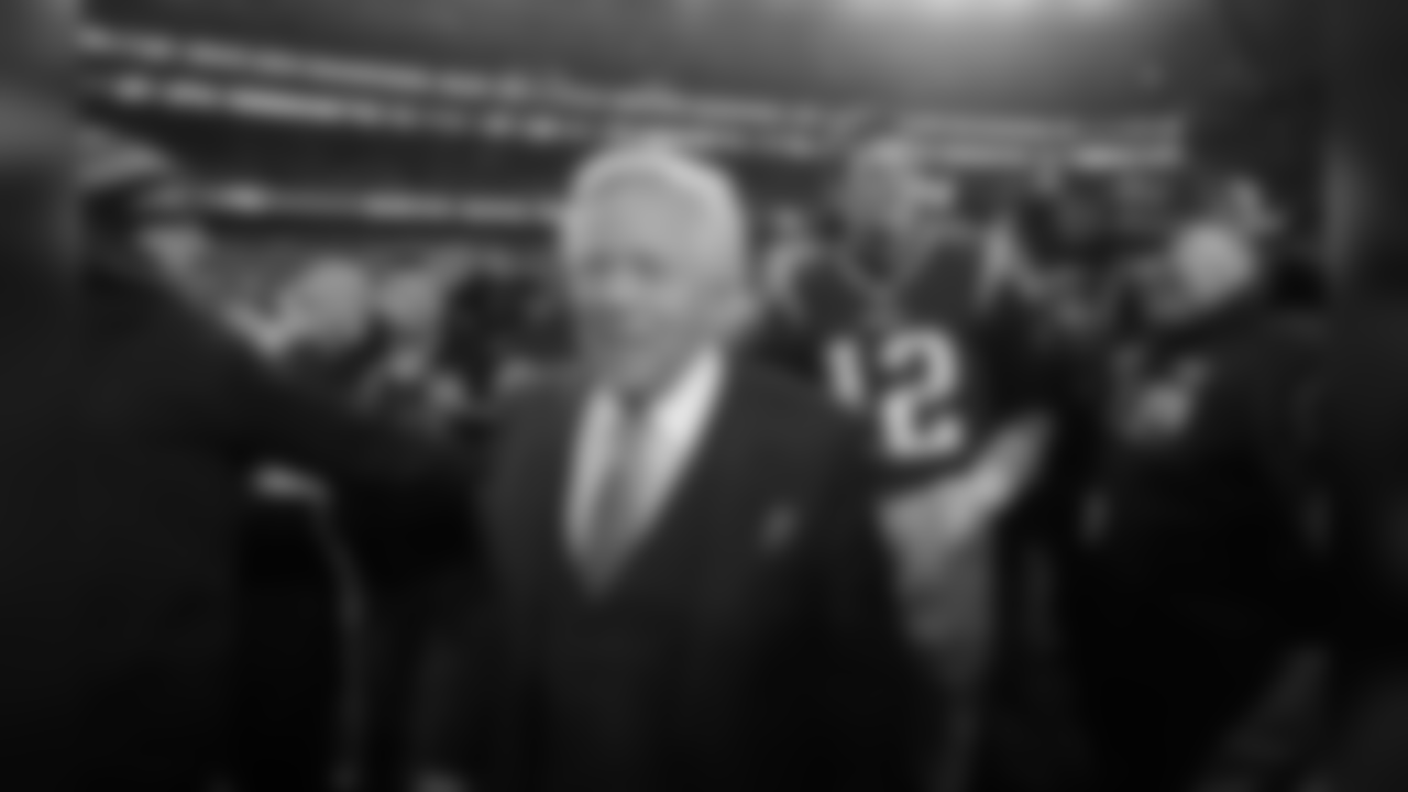 New England Patriots owner Robert Kraft and quarterback Tom Brady (12) leave the field after winning the AFC championship NFL football game against the Jacksonville Jaguars, Sunday, Jan. 21, 2018, in Foxborough, Mass. (AP Photo/Charles Krupa)
