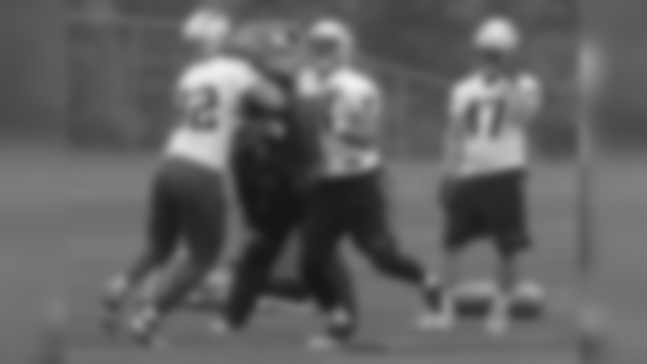 New England Patriots tights end Rob Gronkowski, center, and Matt Lengel, left, run through a drill as fullback Glenn Gronkowski (47) watches during an NFL football organized team activities practice Thursday, May 25, 2017, in Foxborough, Mass. (AP Photo/Bill Sikes)