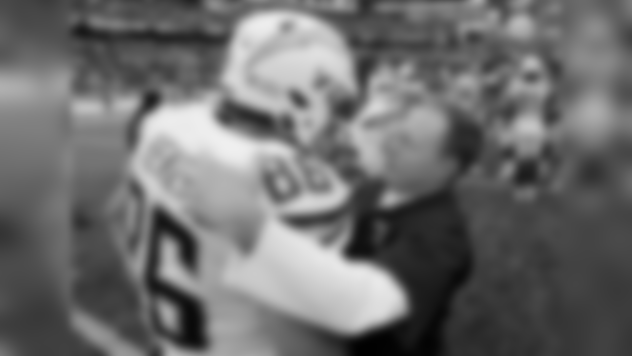 Los Angeles Chargers tight end Hunter Henry (86) and New England Patriots head coach Bill Belichick speak at midfield after an NFL football game, Sunday, Oct. 29, 2017, in Foxborough, Mass. (AP Photo/Steven Senne)