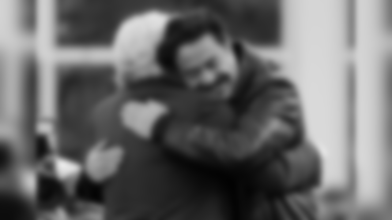 New England Patriots owner Robert Kraft, left, embraces Jacksonville Jaguars owner Shahid Khan before the AFC championship NFL football game, Sunday, Jan. 21, 2018, in Foxborough, Mass. (AP Photo/Steven Senne)
