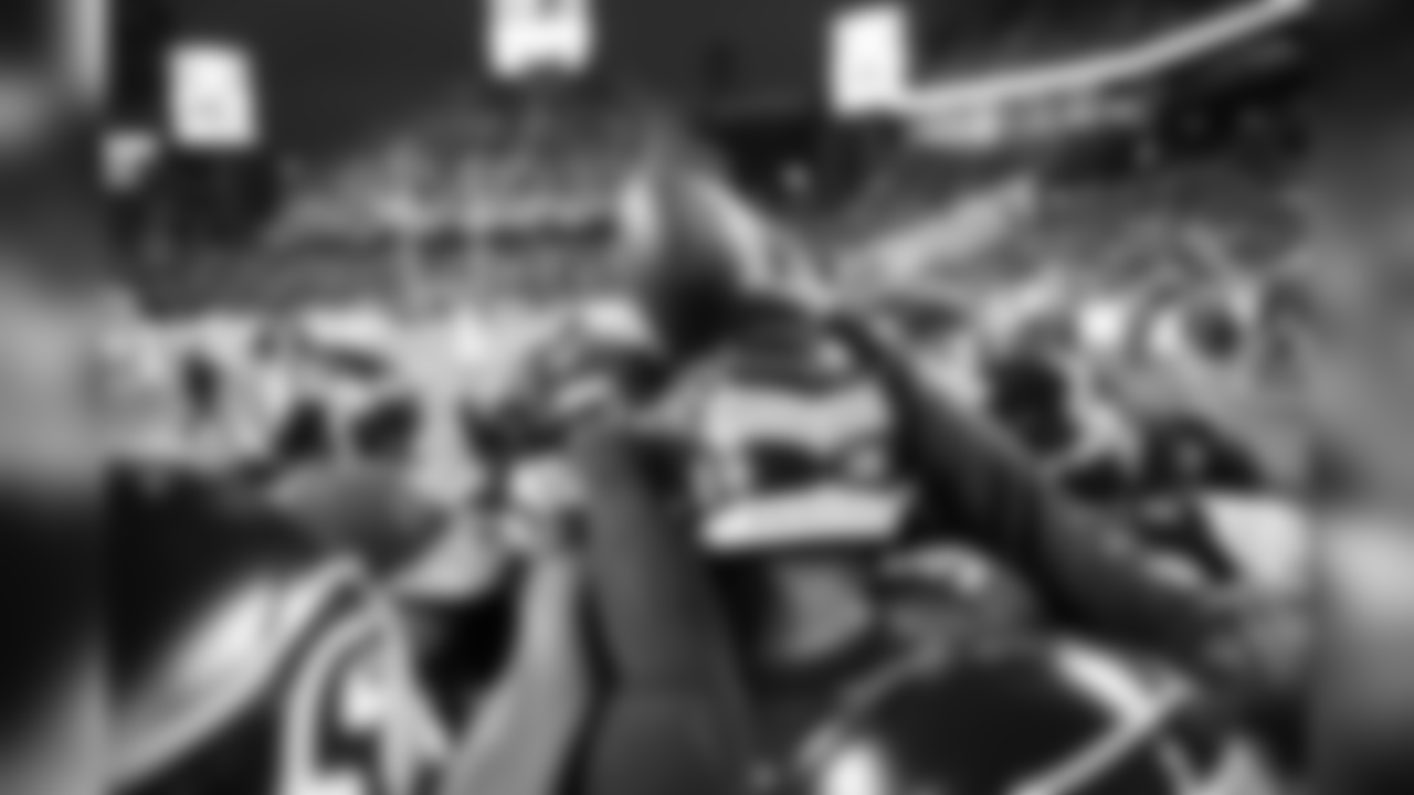 The Seahawks defensive backs huddle together during pregame.