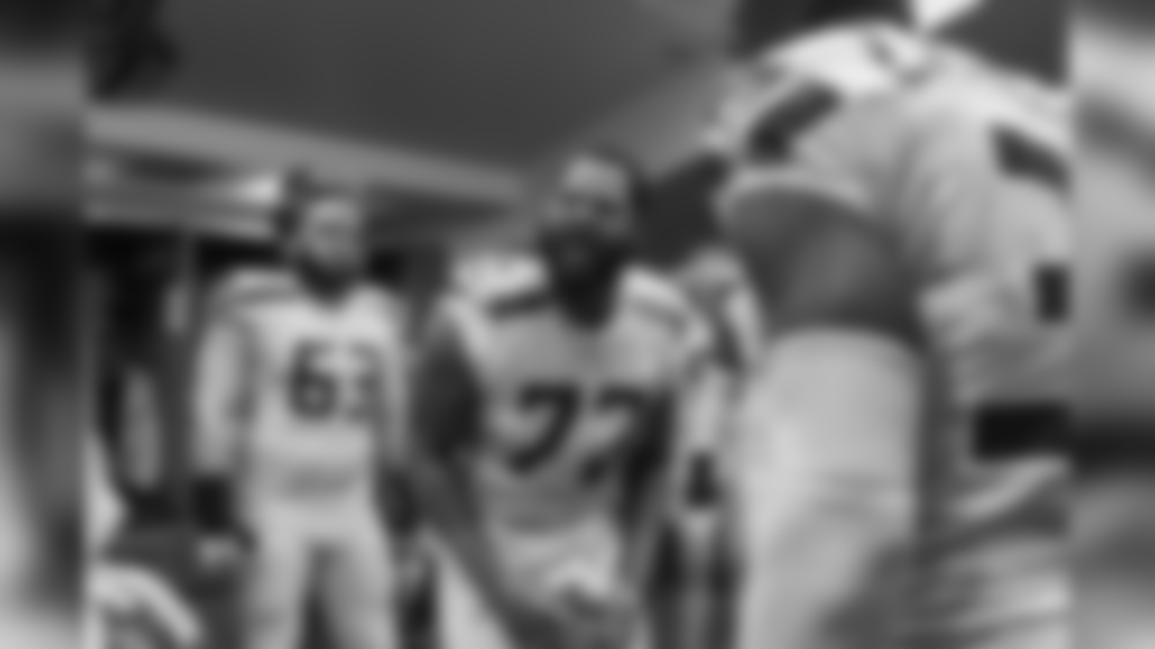 Michael Bennett gets his teammates pumped up before the game.