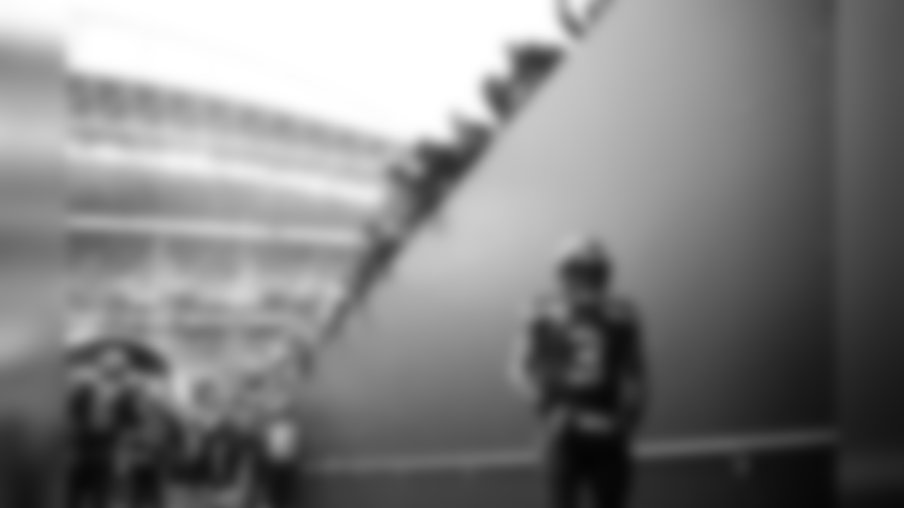 Quarterback Russell Wilson waits for the last of his teammates to emerge from the locker room prior to pregame introductions.