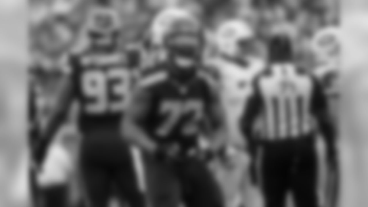 Michael Bennett strikes a pose after sacking Jet's quarterback Ryan Fitzpatrick.