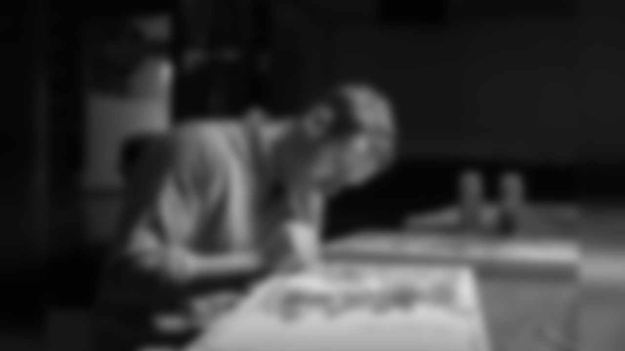 Jon Norquist from Coffee on Canvas (CoffeeOnCanvas.com) creates a piece of artwork for the Seahawks schedule release.