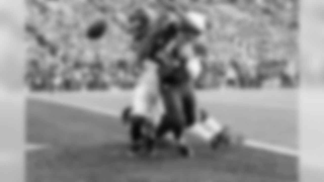 Tyler Lockett has a potential touchdown pass batted away by Arizona defenders in the first quarter.