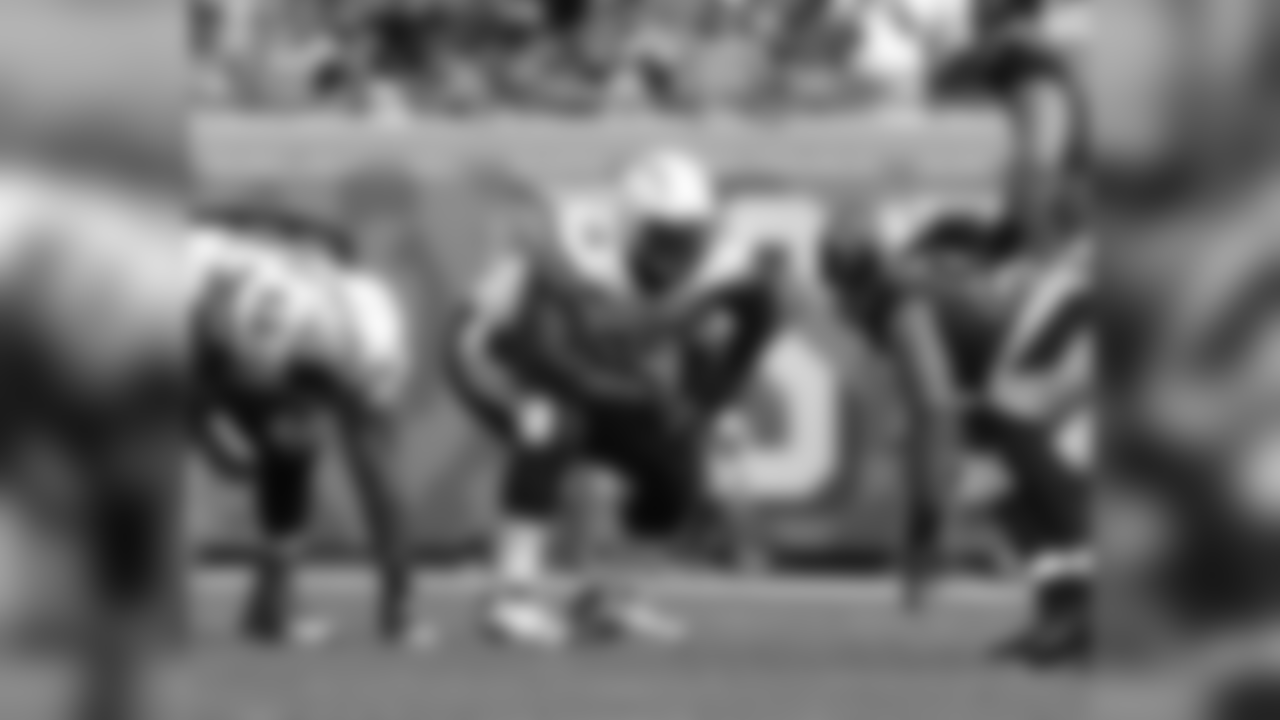 San Diego Chargers' rookie right tackle D.J. Fluker (76) lines up before the snap during a game against the Jacksonville Jaguars at EverBank Field in Jacksonville, Florida, Sunday, October 20, 2013. (AP Photo/Chris Covatta)