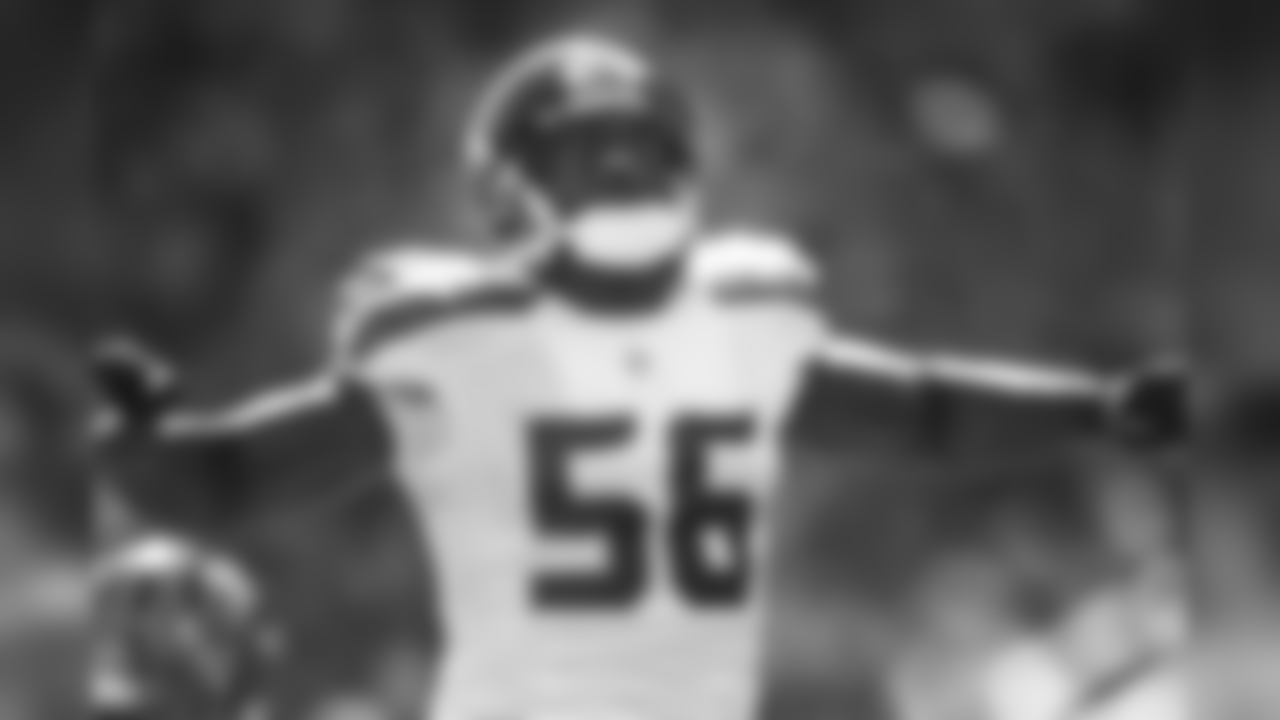 Cliff Avril lets out a yell after a defensive stop in the first half.