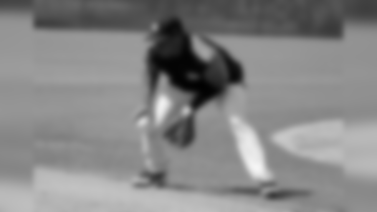 Seattle Seahawks NFL football team quarterback Russell Wilson does drills at New York Yankees baseball spring training camp, Monday, Feb. 26, 2018, in Tampa, Fla. (AP Photo/Lynne Sladky)