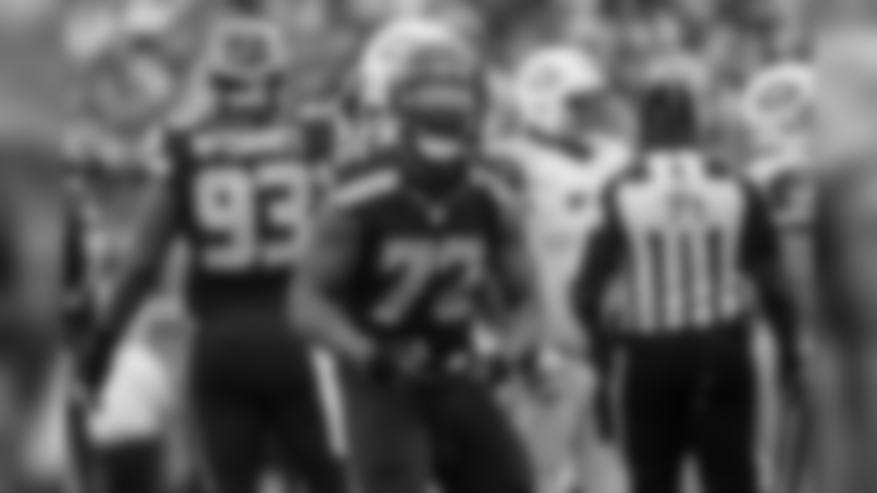 Michael Bennett strikes a pose after sacking Jet's quarterback Ryan Fitzpatrick.