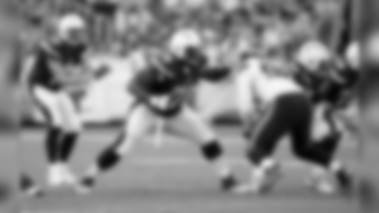 San Diego Chargers tackle D.J. Fluker (76) blocks during the 2015 NFL preseason football game against the Seattle Seahawks on Saturday, Aug. 29, 2015 in San Diego. The Seahawks won the game 16-15. (Paul Spinelli via AP)