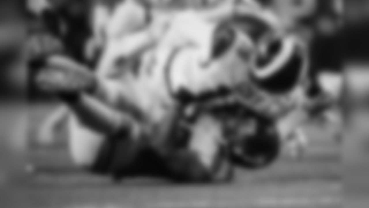 Michael Bennett sacks Rams quarterback Jared Goff.