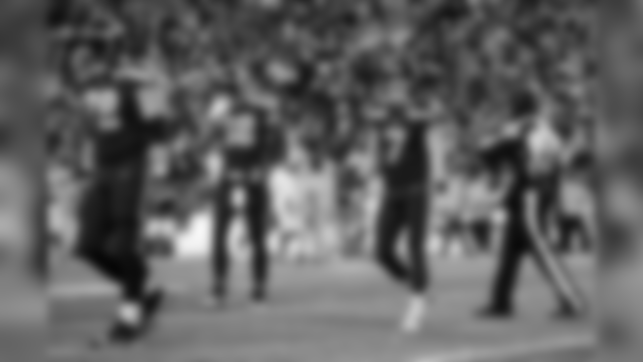 Seahawks kicker Blair Walsh, along with teammates Luke Joeckel and Jimmy Graham, walk off the field after a missed field goal in the fourth quarter.