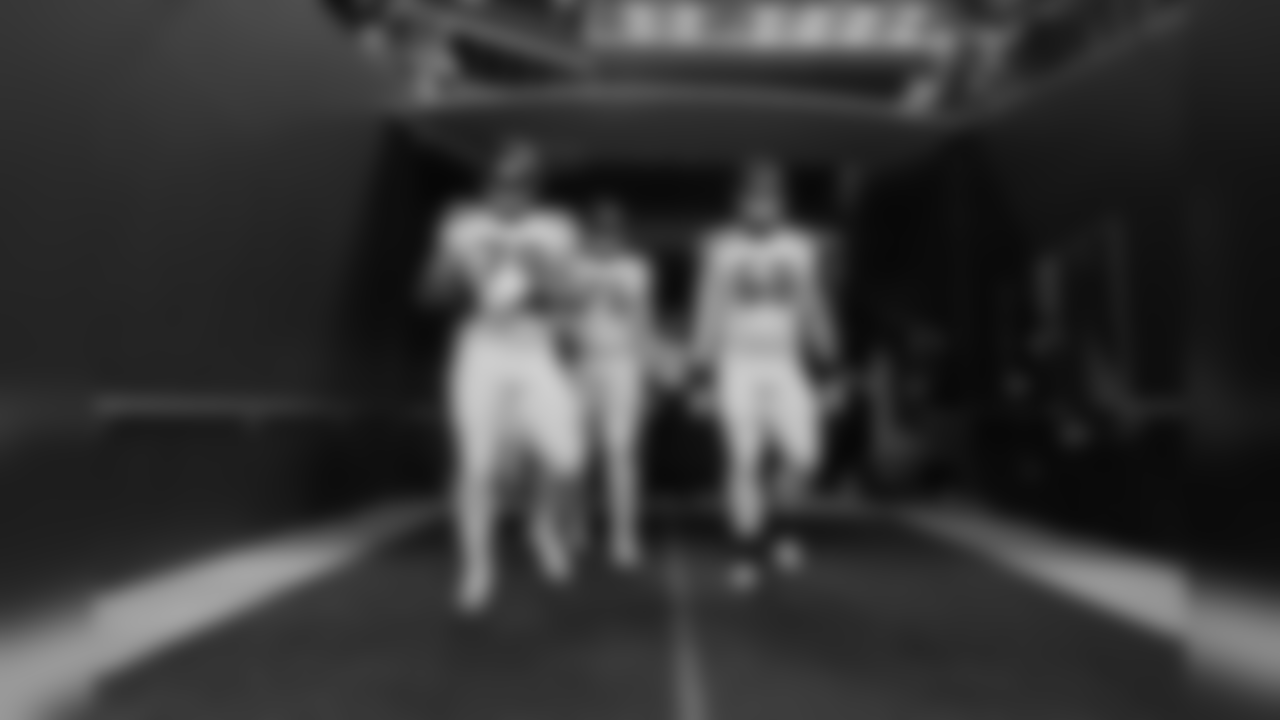 Garry Gilliam, Germain Ifedi and Justin Britt come out of the tunnel before the game.