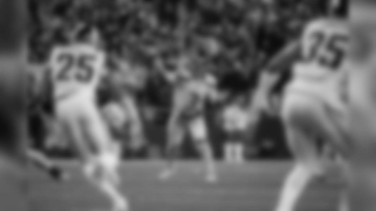 Russell Wilson throws a pass.
