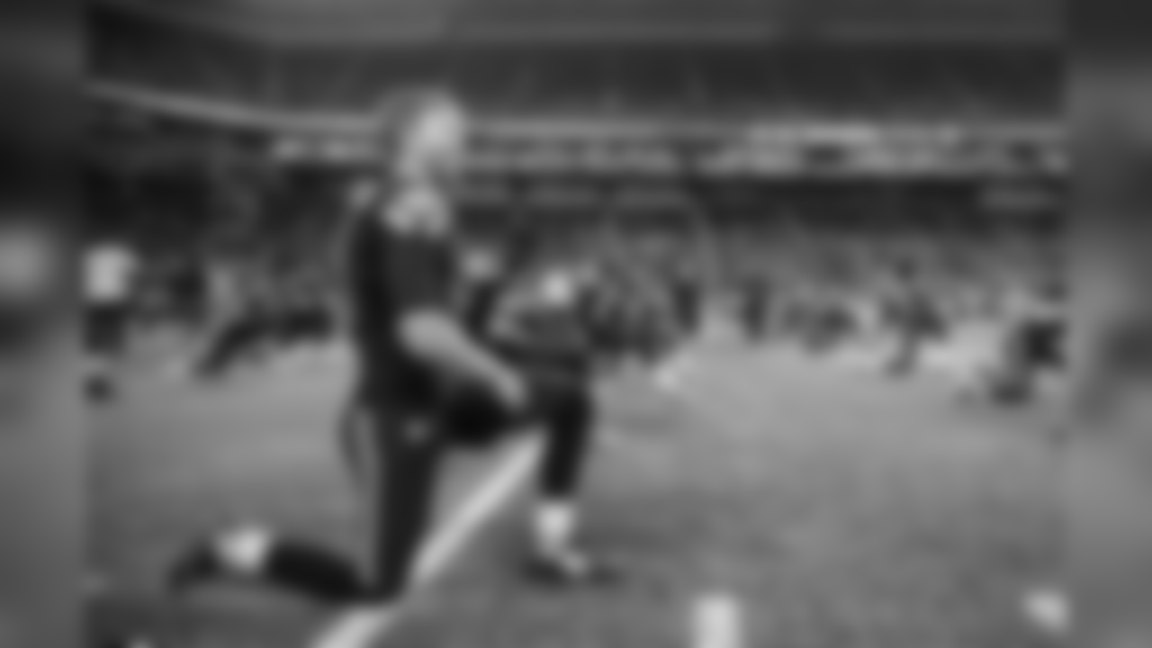 Kicker Steven Hauschka stretches before the game.