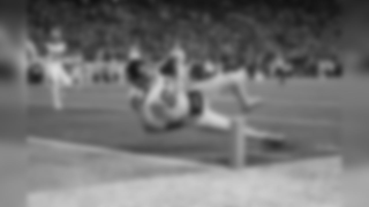 Luke Willson dives into the end zone for a touchdown.
