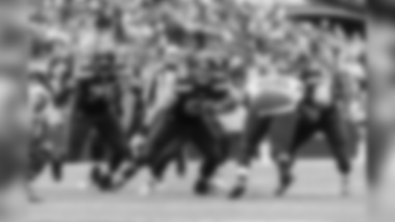 Seattle's offensive line including Germaine Ifedi, Justin Britt and Mark Glowinski block for running back Thomas Rawls.