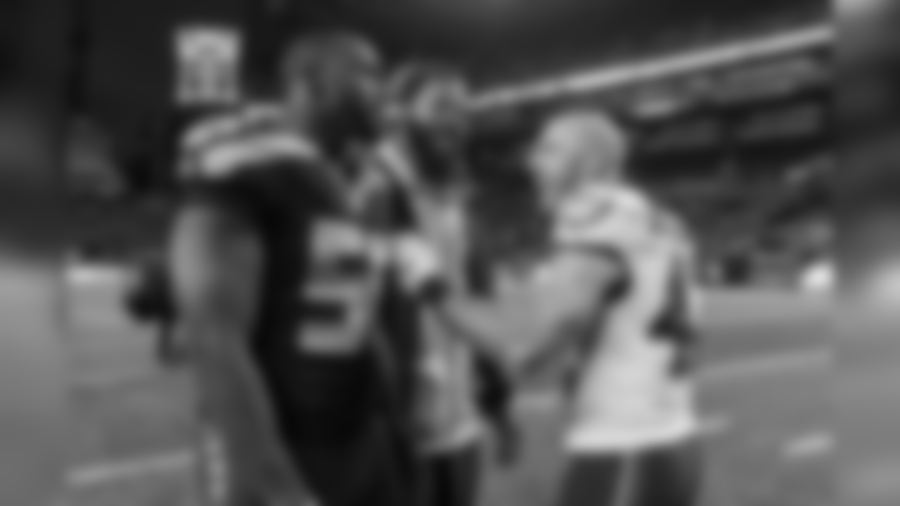 Seahawks Cliff Avril and Michael Bennett joked with former Super Bowl teammate and current Eagles player Chris Maragos after the game.