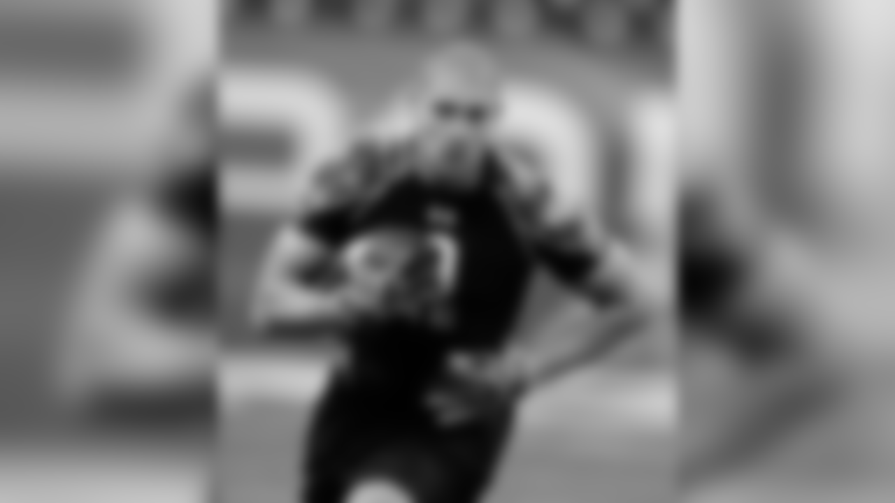 Miami's Jimmy Graham runs a drill at the NFL football scouting combine in Indianapolis. (AP Photo/Darron Cummings, File)