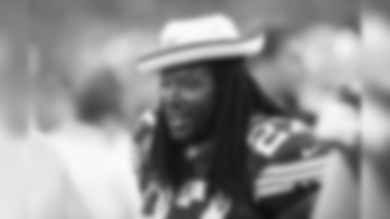 Green Bay Packers' Eddie Lacy on the sidelines during the second half of an NFL preseason football game against the Oakland Raiders Friday, Aug. 22, 2014, in Green Bay, Wis. (AP Photo/Mike Roemer)