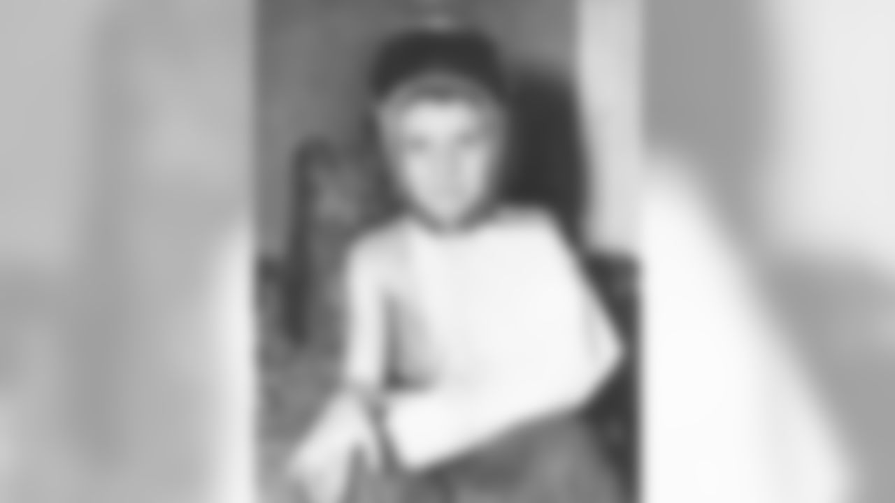 A young Dan Rooney with a broken arm.