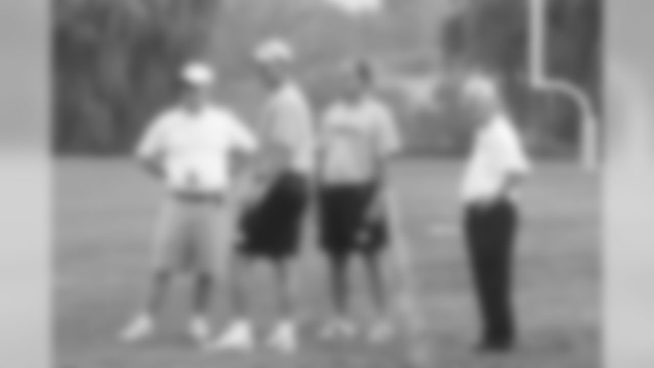 Art Rooney II, Head Coach Bill Cowher, General Manager Kevin Colbert and Dan Rooney on a practice field at Training Camp.