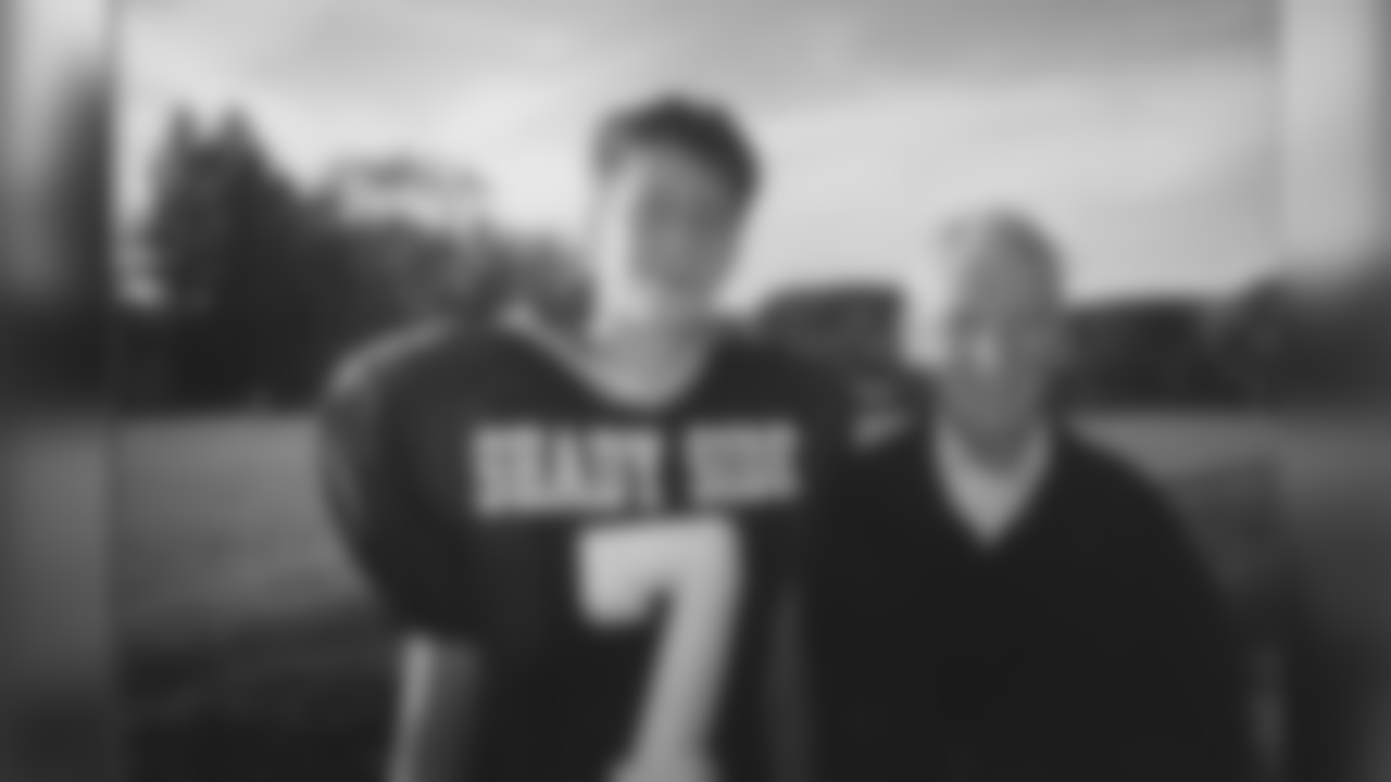 Dan Rooney poses for a photo with his grandson Dan Rooney.