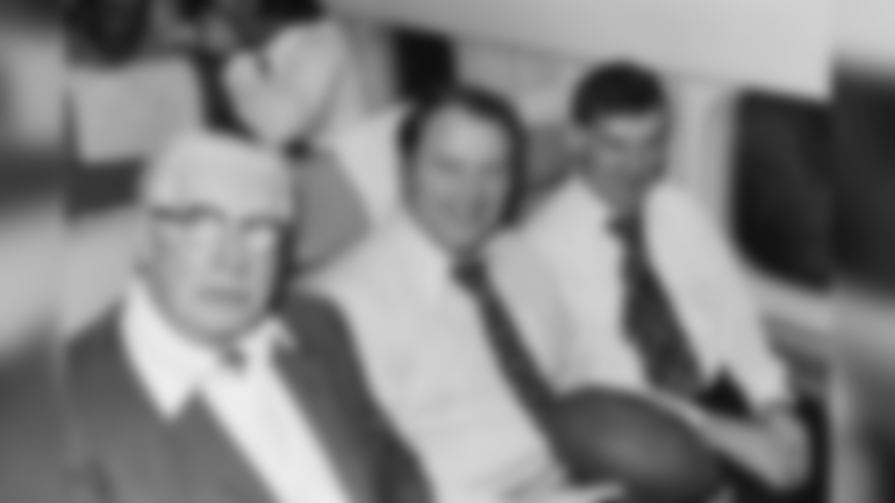 Art Rooney, Chuck Noll and Dan Rooney sitting on the team plane heading for Super Bowl IX.