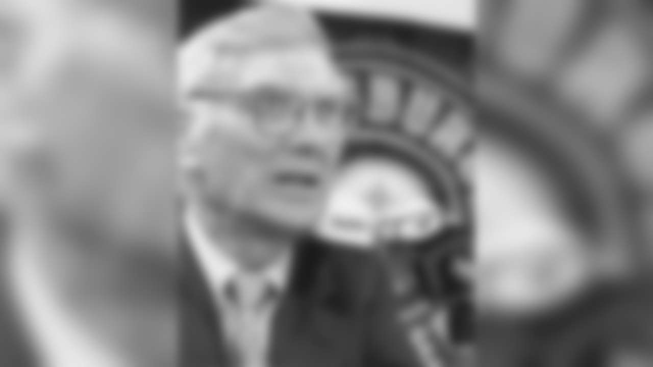 A portrait of Dan Rooney during a press conference.
