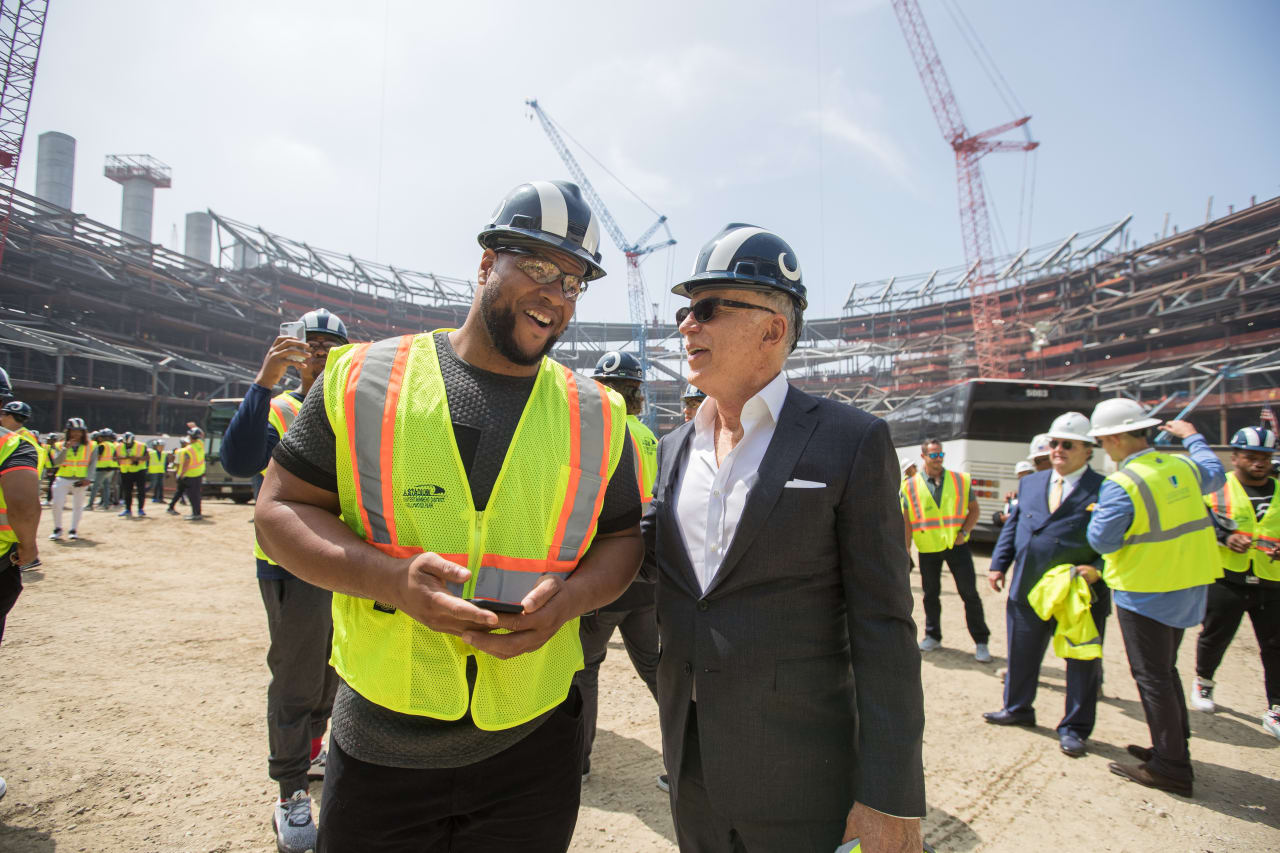 Owner Stan Kroenke and (93) Ndamukong Suh of the Los Angeles Rams speak while on a tour with the team of the new Inglewood Stadium site, Thursday June 14, 2018, in Inglewood, CA. (Jeff Lewis/Rams)