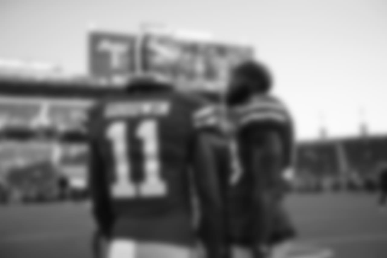 WR Marquise Goodwin and WR Aldrick Robinson