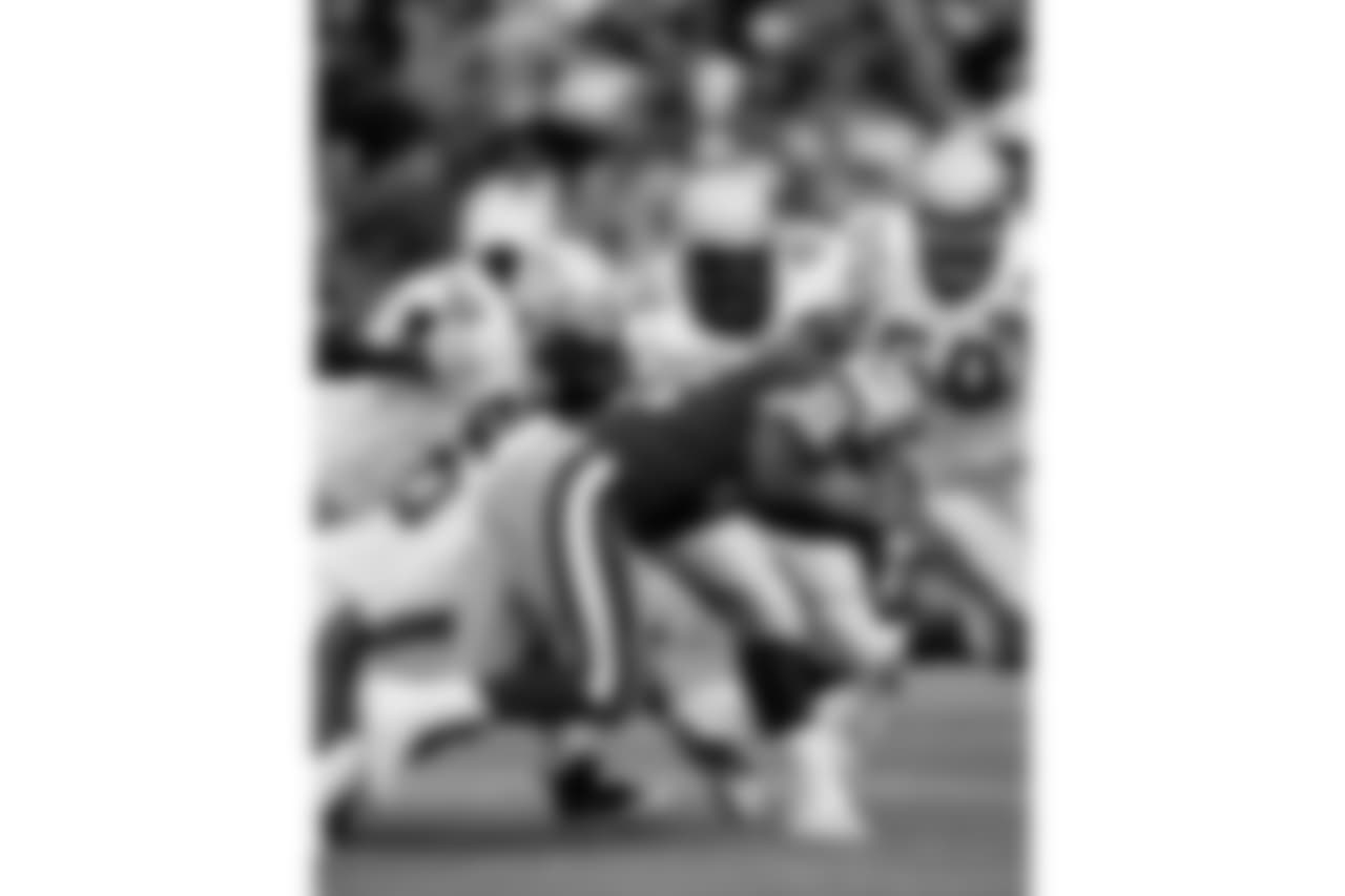 1994 -- 49ers running back Ricky Waters and Seahawks tackle Cortez Kennedy.