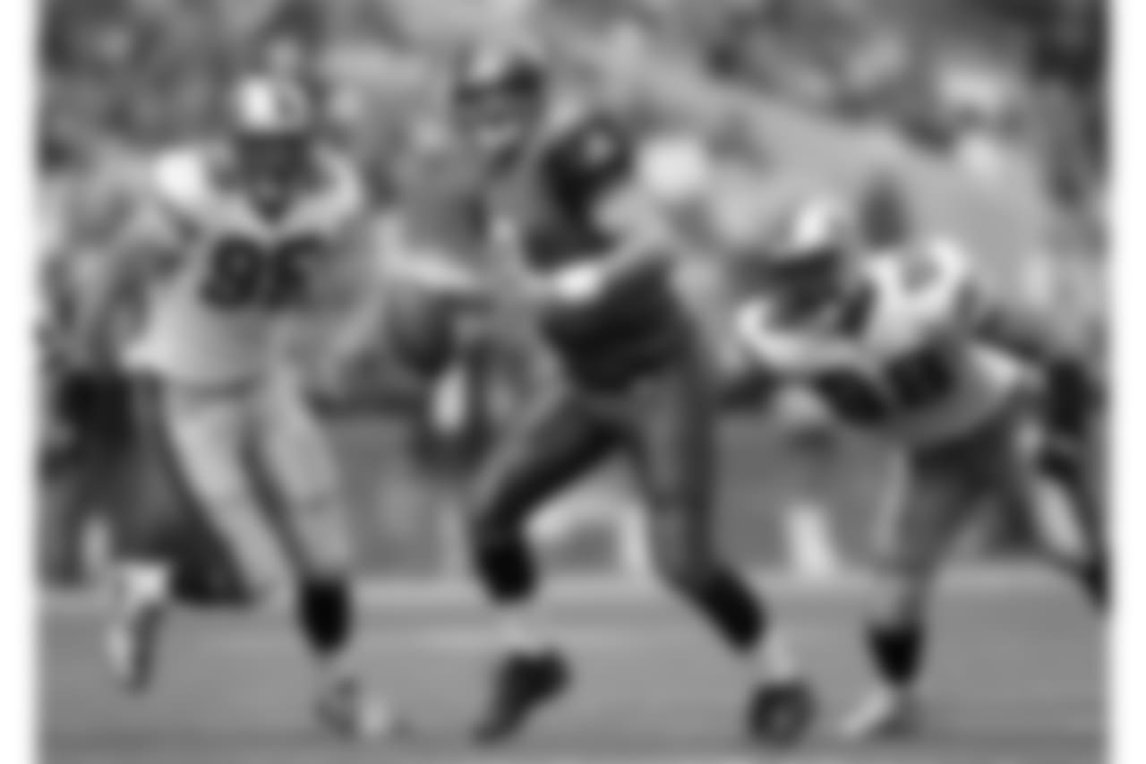 2004 -- Seahawks quarterback Matt Hasselbeck and 49ers pass-rushers John Engleberger and Julian Peterson.