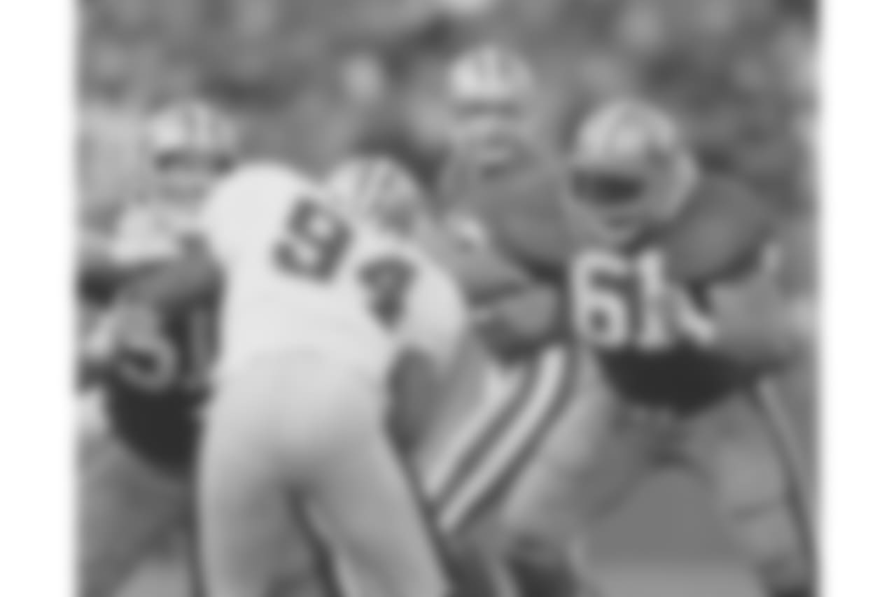 QB Joe Montana, C Randy Cross and G Jesse Sapolu