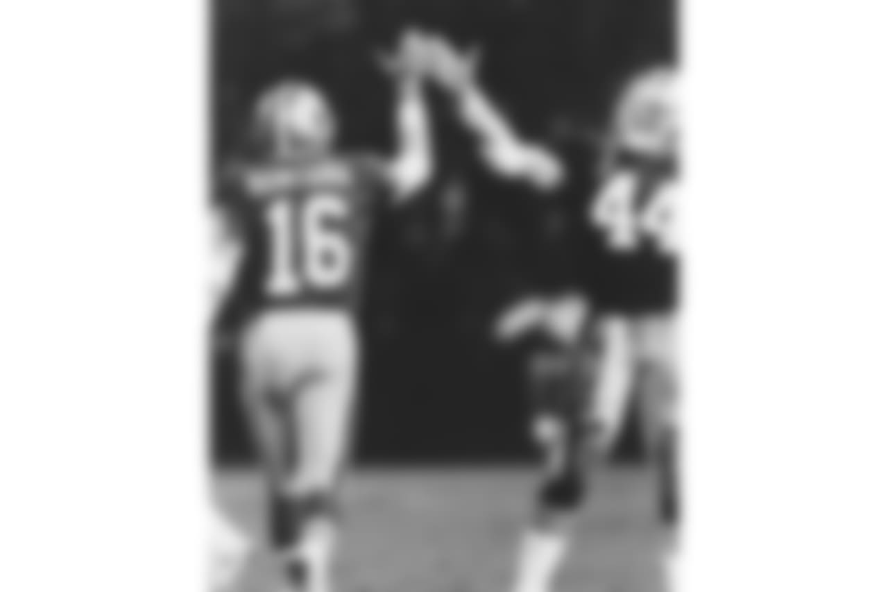 QB Joe Montana and RB Tom Rathman