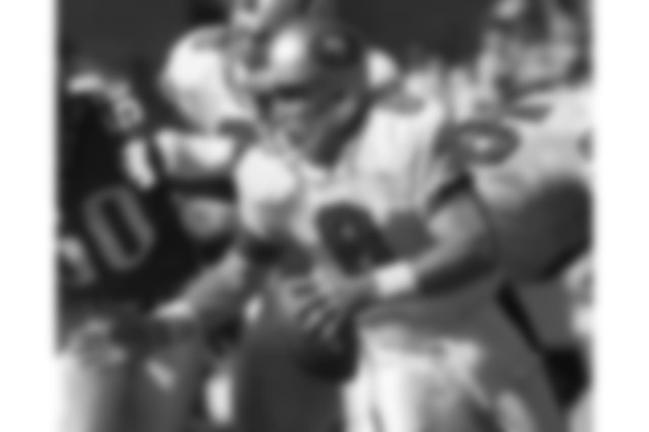 Aug. 18, 1997 -- Steve Young rolls out during a preseason game.