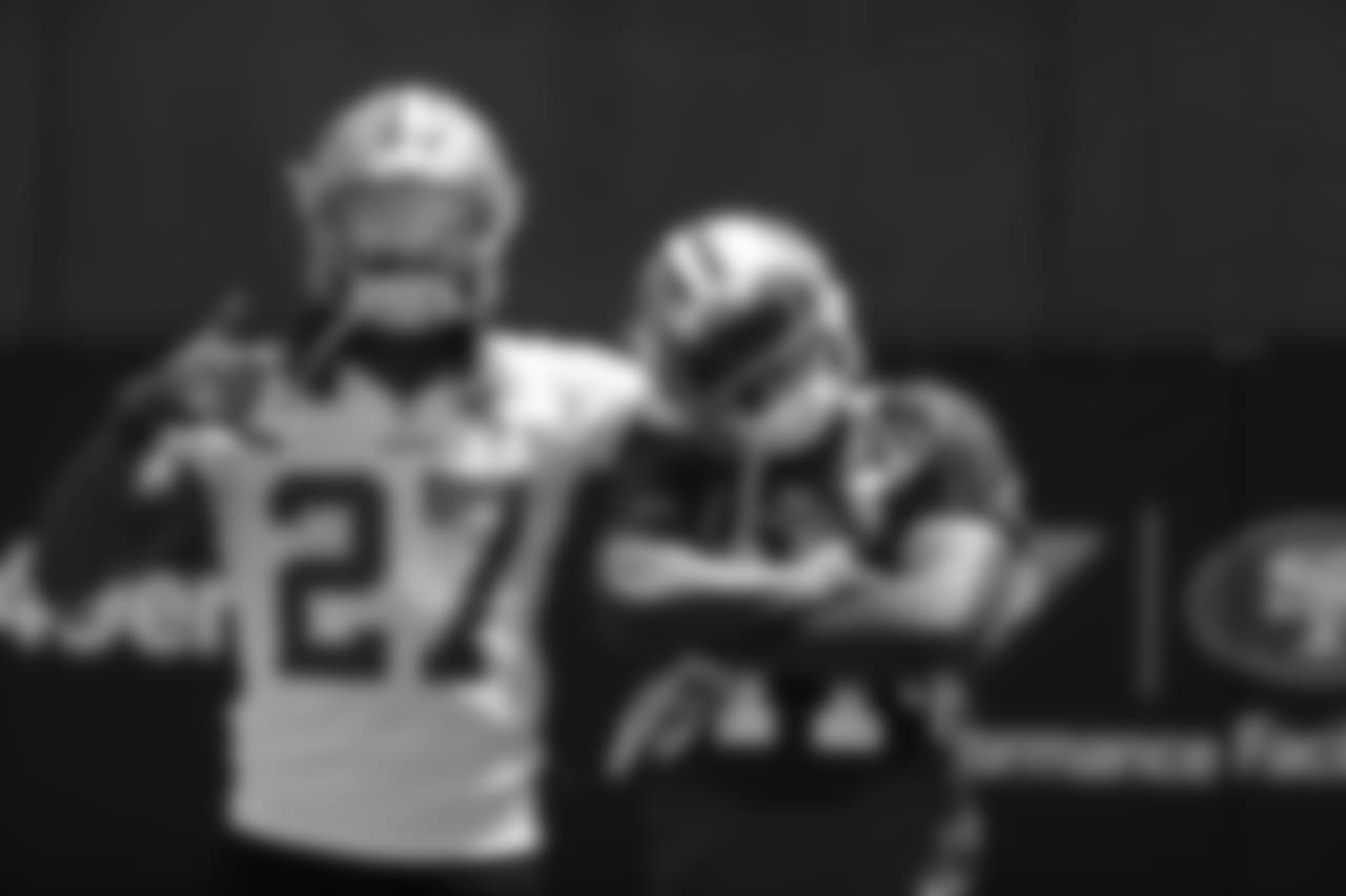 DB Adrian Colbert and WR Marquise Goodwin