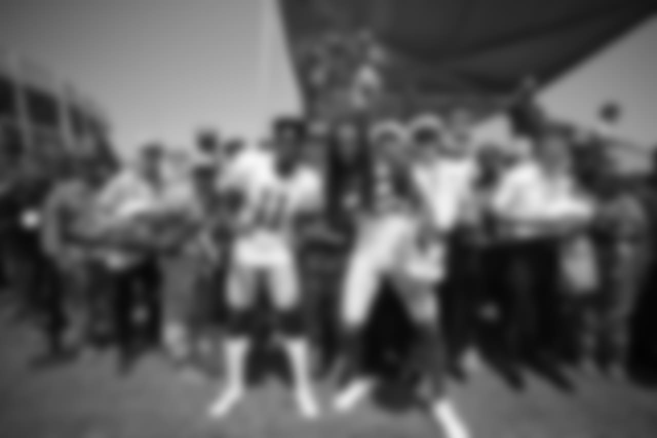 WR Marquise Goodwin and CB Richard Sherman
Day 12: Military Hosted by Quarterbacks
