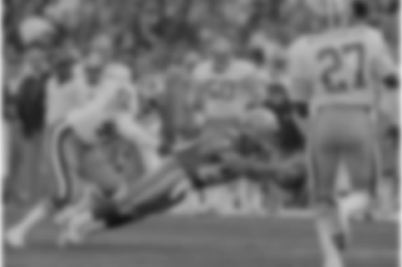 1986 -- Seahawks wideout Steve Largent and 49ers safety Ronnie Lott.