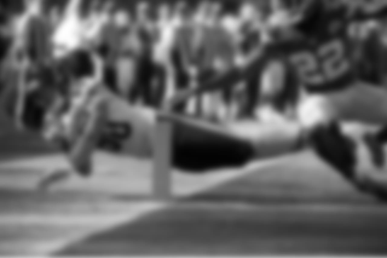 Chicago Bears wide receiver Marc Mariani is pushed out of bounds before reaching the end zone