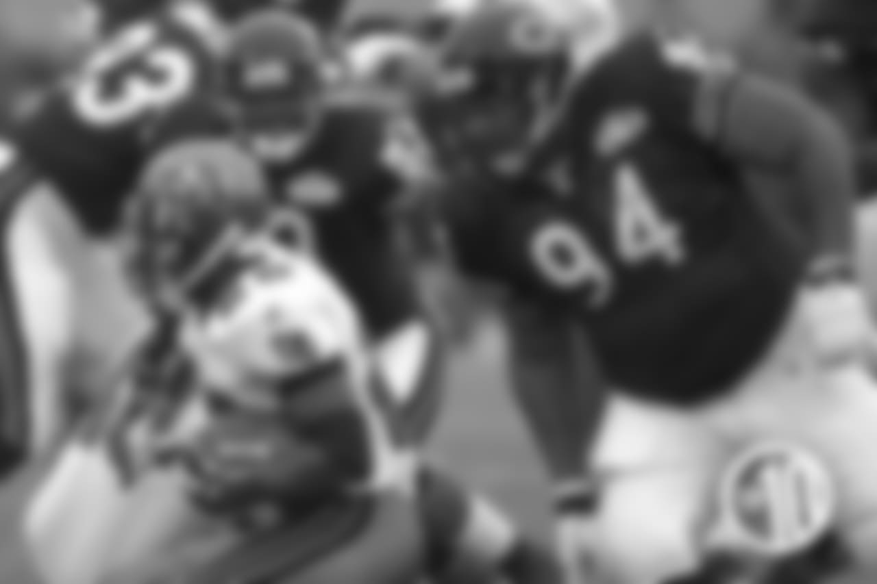 The enormous 6-2, 340-pound defensive tackle teamed with Ted Washington to form one of the NFL's fiercest run-stuffing duos in 2001-02.