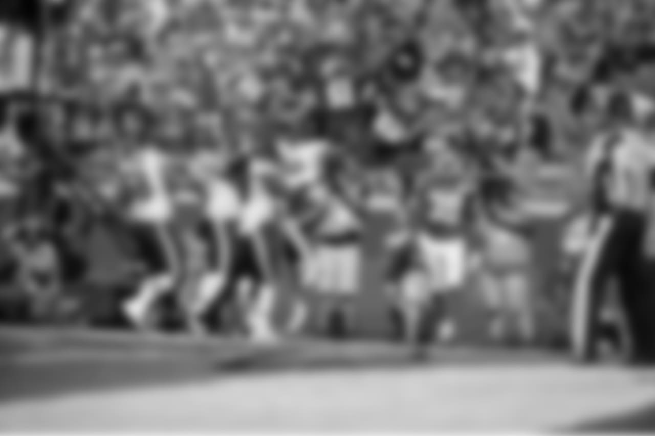 Chicago Bears running back Matt Forte celebrates his game winning touchdown with teammates