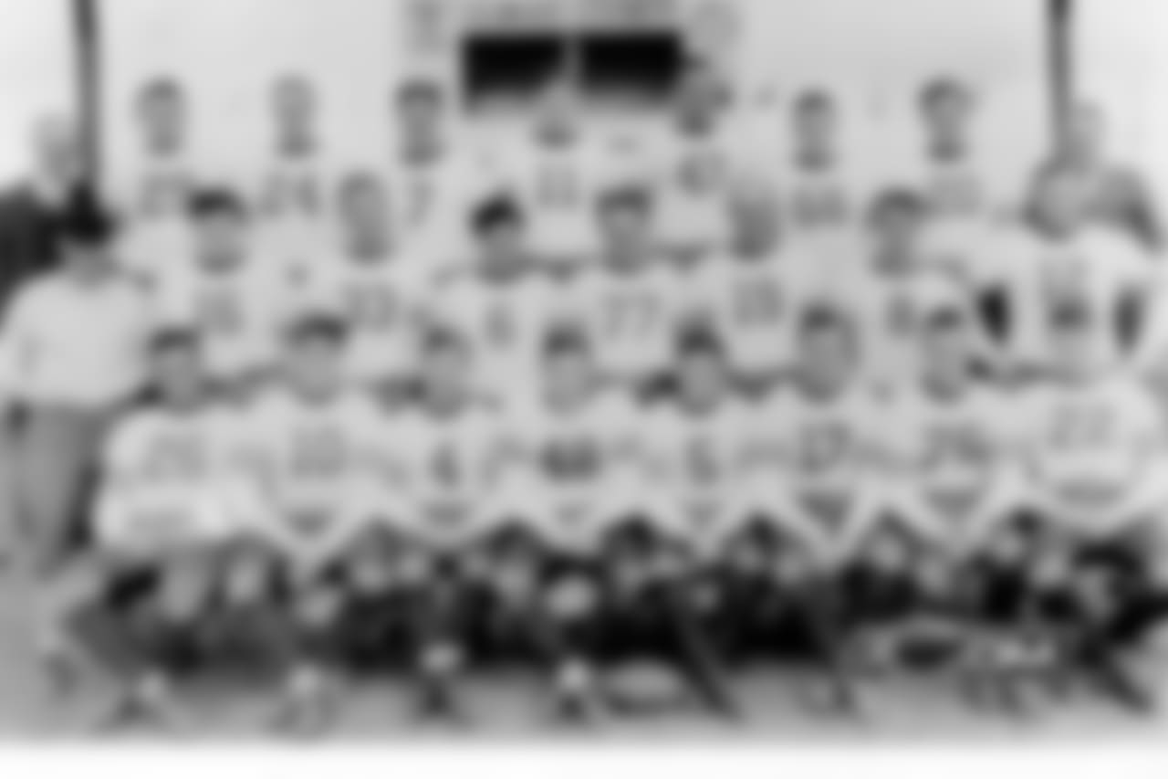 Molesworth 5. Corbett 6. Ronzani 7. Sisk 8. Brumbaugh 10. Manders 11. Hansen 12. Lyman 16. Musso 17. Pederson 19. Kawal 20. Carlson 22. Carr 24. Johnsos 26. Pearson 29. Kopcha 33. Masterson 47. Rosequist 48. Feathers 56. Hewitt 76. Miller 77. Grange George Halas - Head Coach