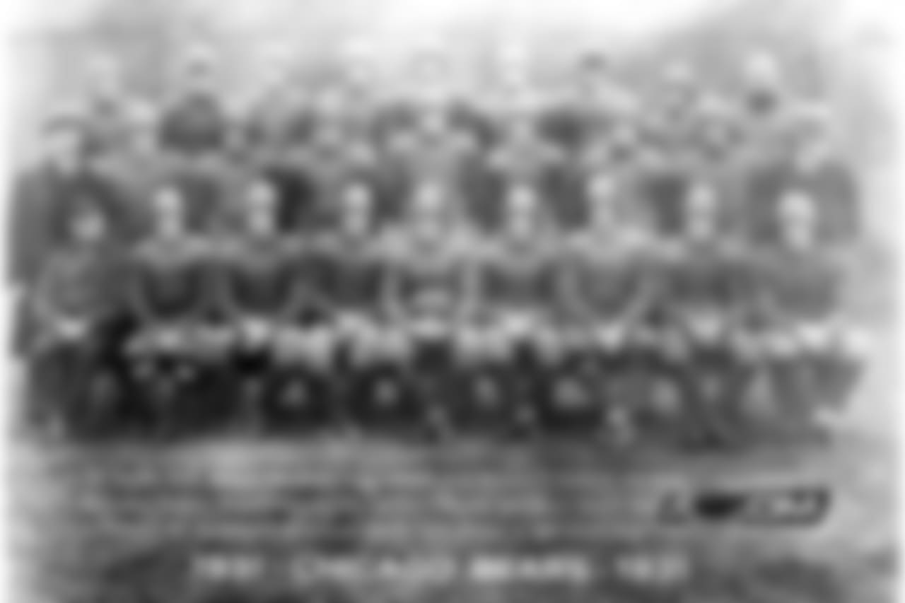 Nesbitt 3. Nagurski 4. Molesworth 5. Walquist 7. Lintzenich 8. Brumbaugh 9. Franklin 12. Lyman 13. Trafton 14. Burdick 16. Buckler 18. Murray 19. Tackwell 20. Carlson 21. McMullen 22. Schuette 23. Drury 24. Johnsos 25. Grange 26. Pearson 33. Joesting 54. Hibbs 77. Grange George Halas - President, Ralph Jones - Head Coach