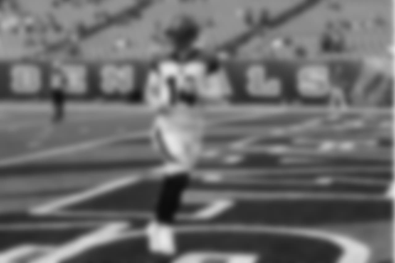 Cincinnati Bengals quarterback Andy Dalton runs to the lorckerrooms before an NFL preseason football game, Thursday, Aug. 9, 2018, in Cincinnati. (AP Photo/Frank Victores)