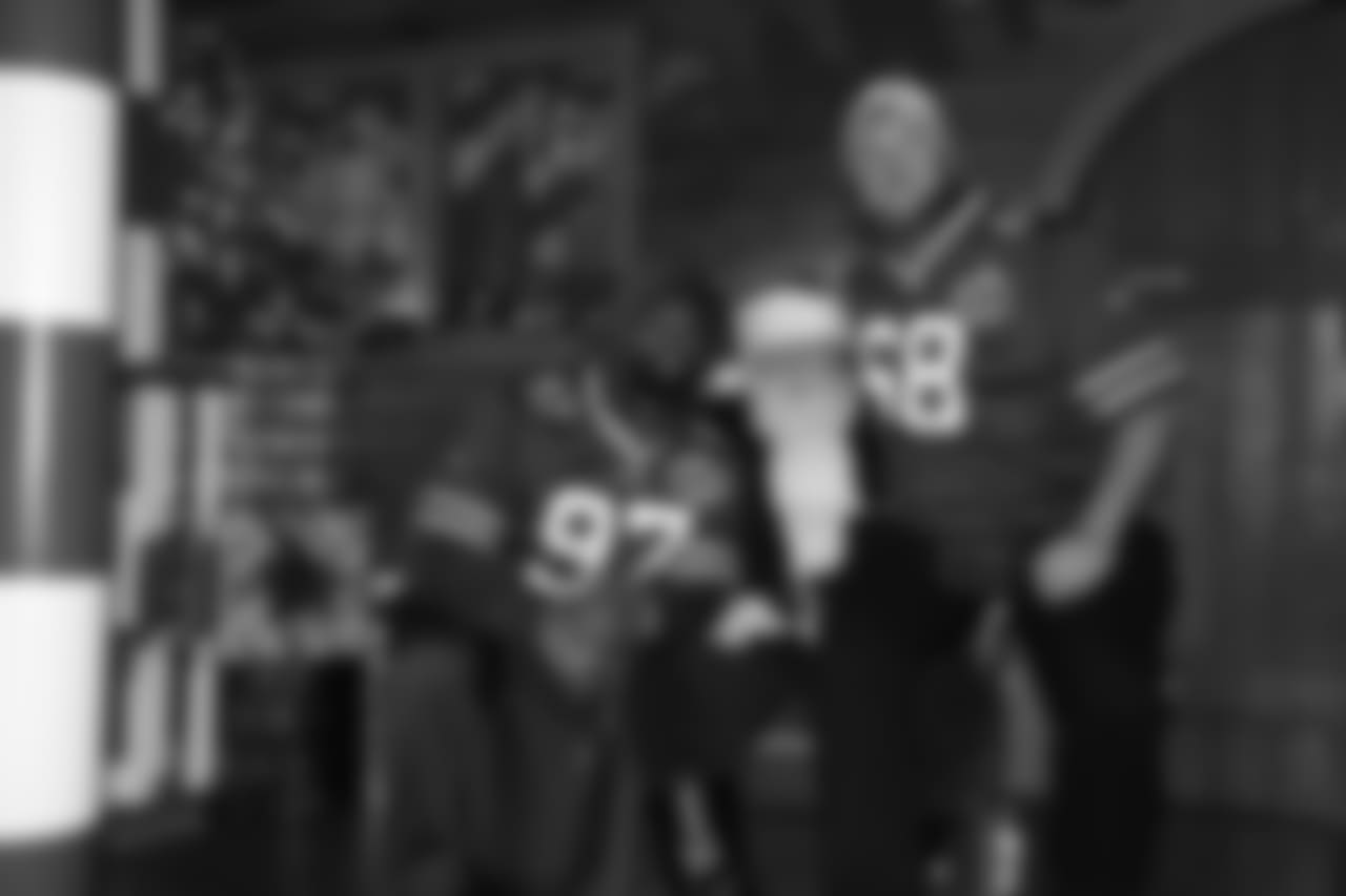 T Conor McDermott (68) and DE Marquavius Lewis (97)