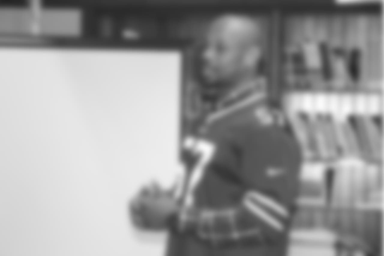 Lorenzo Alexander mentoring students at South Park High School